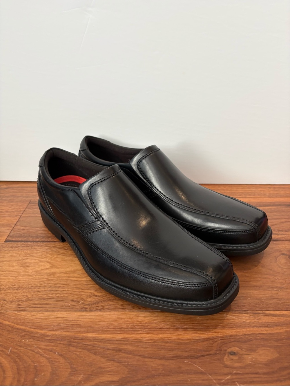 Rockport black slip on leather dress shoes, men’s 13